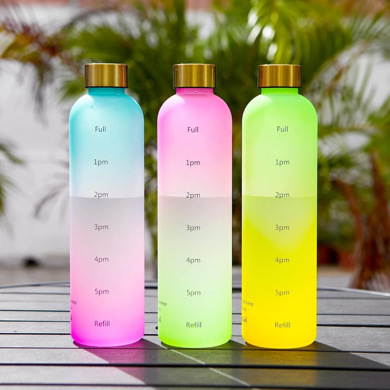 Cute 1 Litre Eco-Friendly Tritan Plastic Water Bottles for Women with Drinking Time Markers and a Stylish Gold Lid.