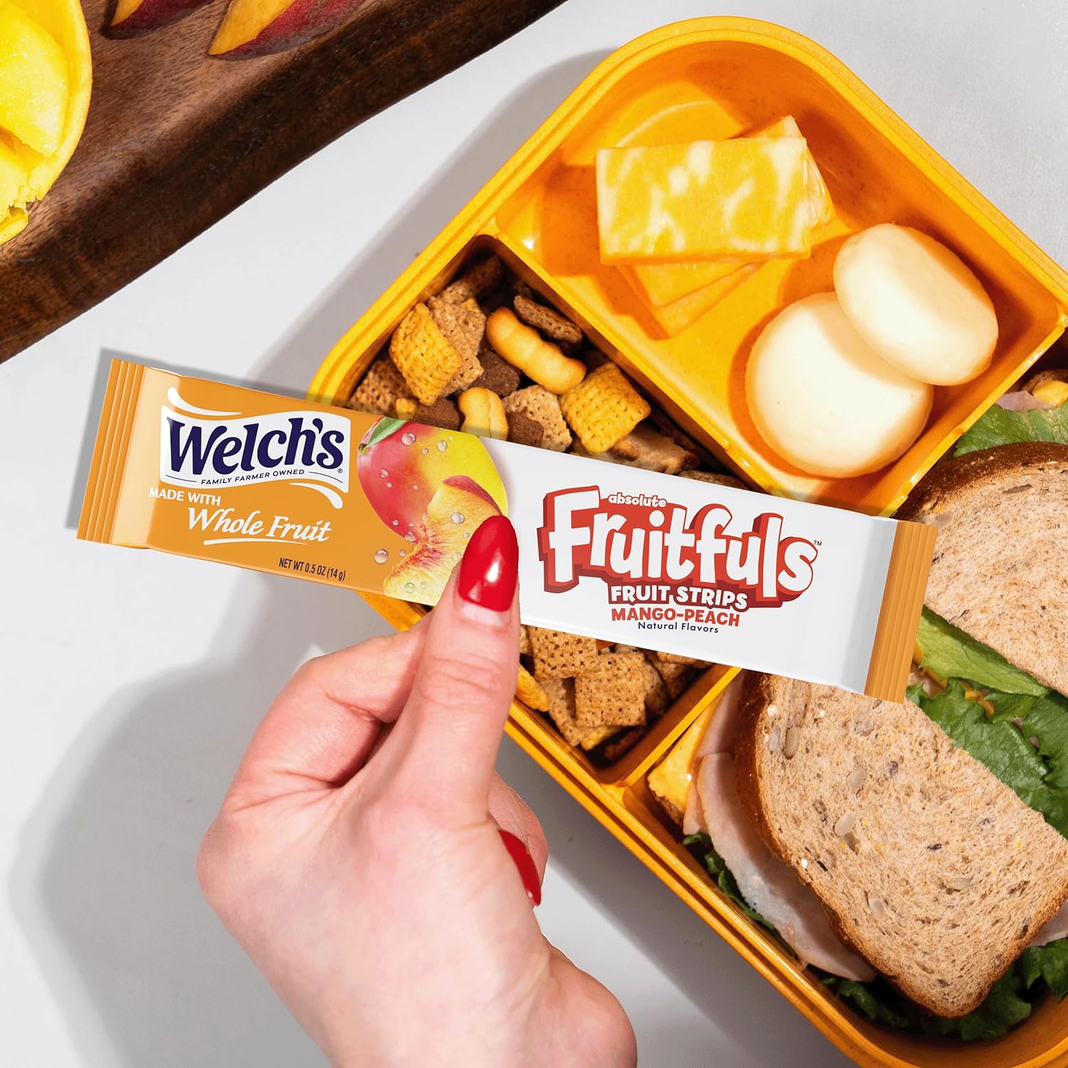 91ctYGiBTEL._SL1500_ Welch’s Absolute Fruitfuls Fruit Strips, Mango Peach Flavored Fruit Leather, Tasty Dried Fruit Snacks for School Lunches, Mango Peach, 0.5oz - Image 1