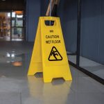 Yellow Plastic "Caution Wet Floor" Folding Safety Sign 30 x 60cm
